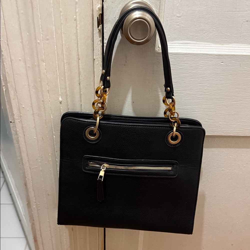 Chic Black Shoulder Bag with Gold Details